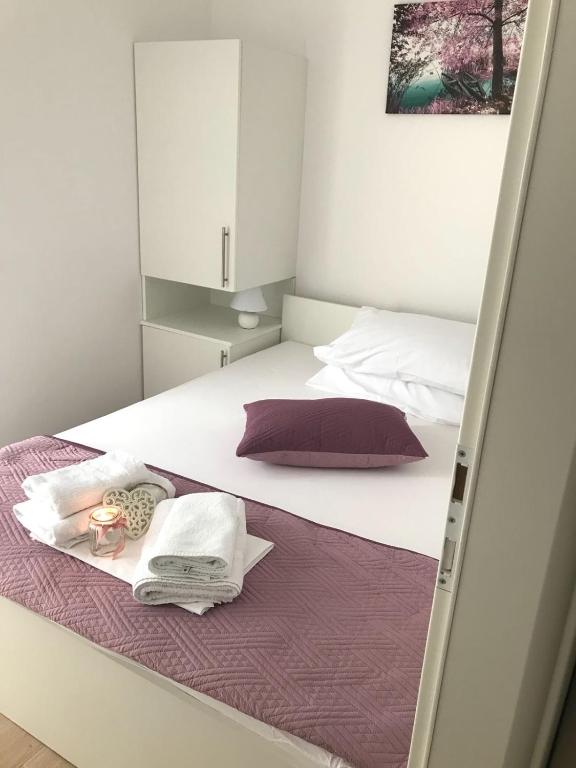 Postel nebo postele na pokoji v ubytování Sweet Apartments