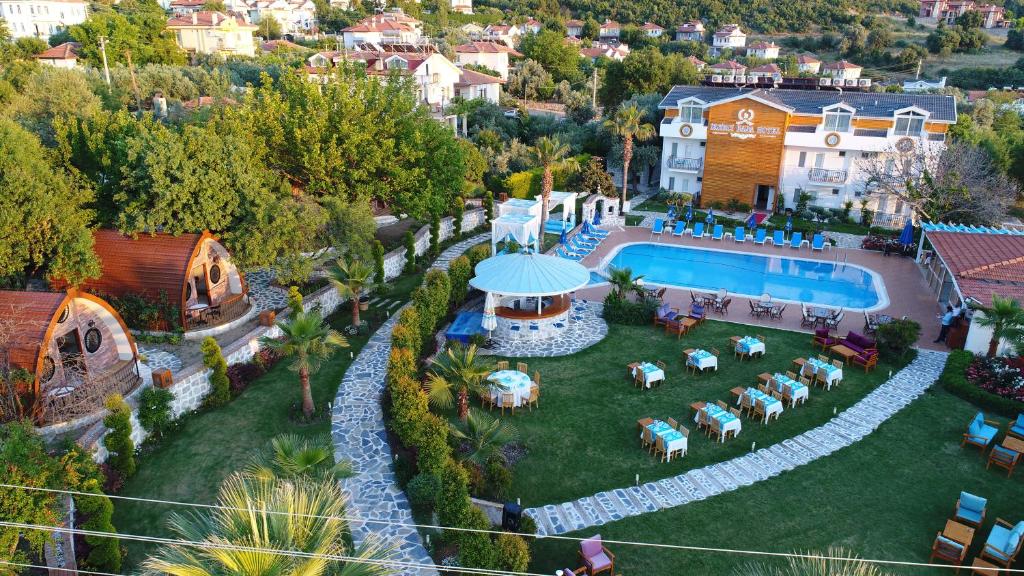 an aerial view of a resort with a swimming pool at İksirci Baba Hotel in Oludeniz