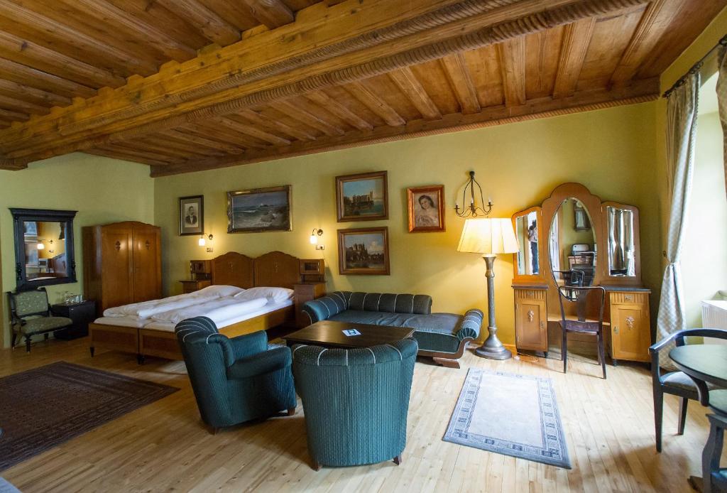 Postel nebo postele na pokoji v ubytování Hotel Leonardo