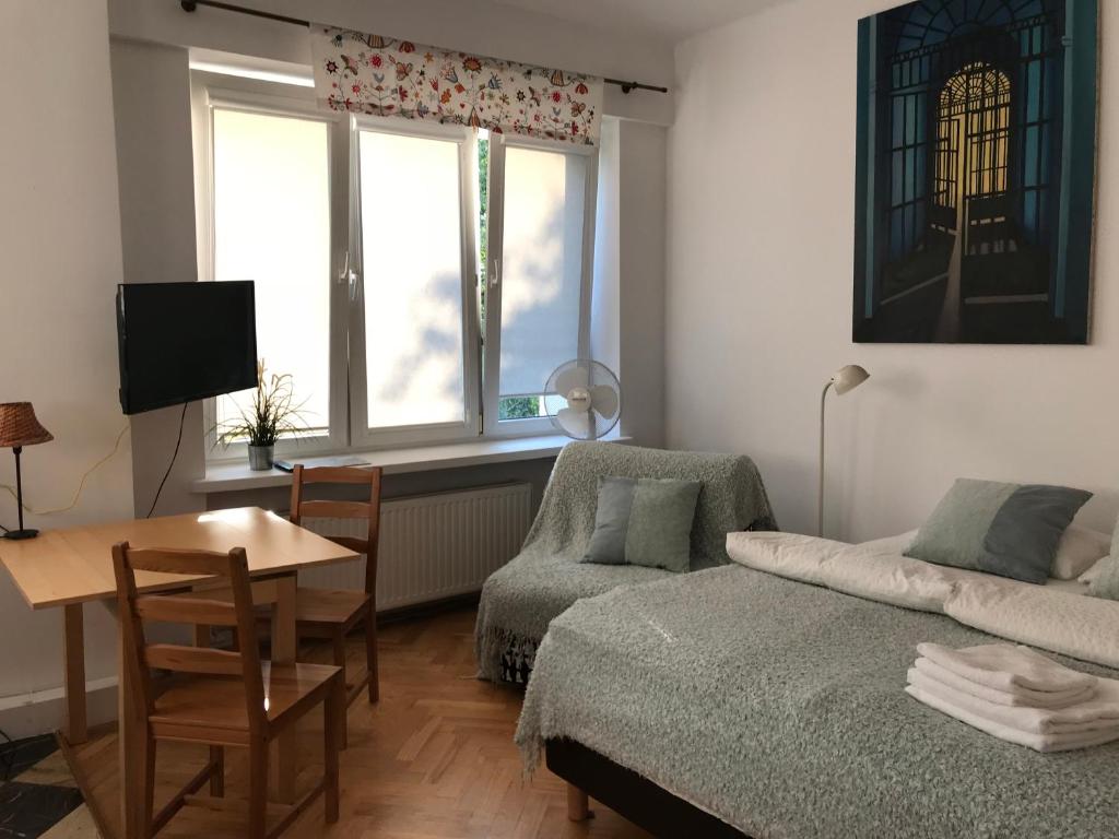 Posteľ alebo postele v izbe v ubytovaní Studio Iwicka