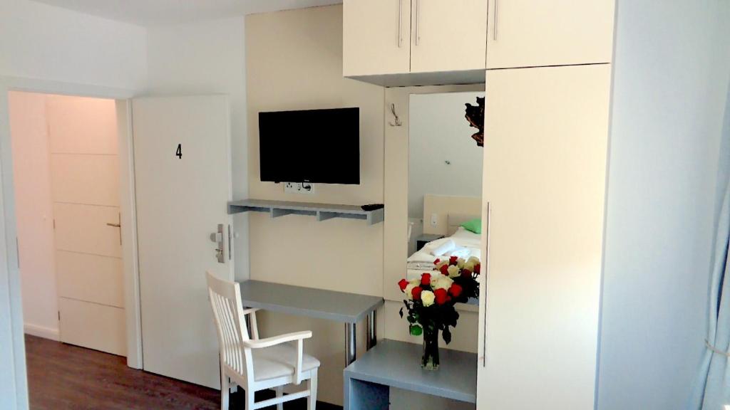Kuchyň nebo kuchyňský kout v ubytování Hotel Stadt Soltau