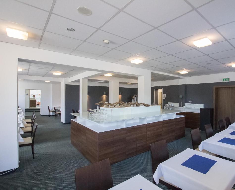 Postel nebo postele na pokoji v ubytování Hotel City Oase Lb