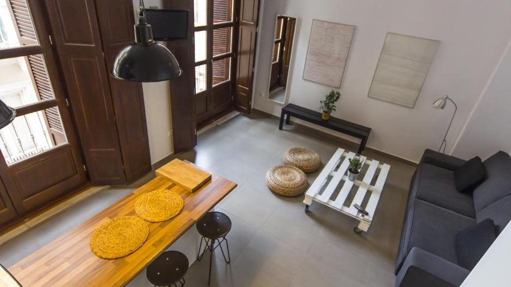 Posezení v ubytování Apartamentos Málaga Picasso