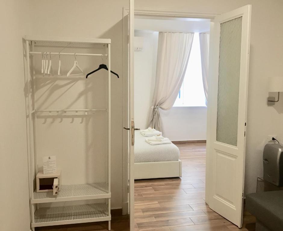 Postel nebo postele na pokoji v ubytování Cavallotti 21