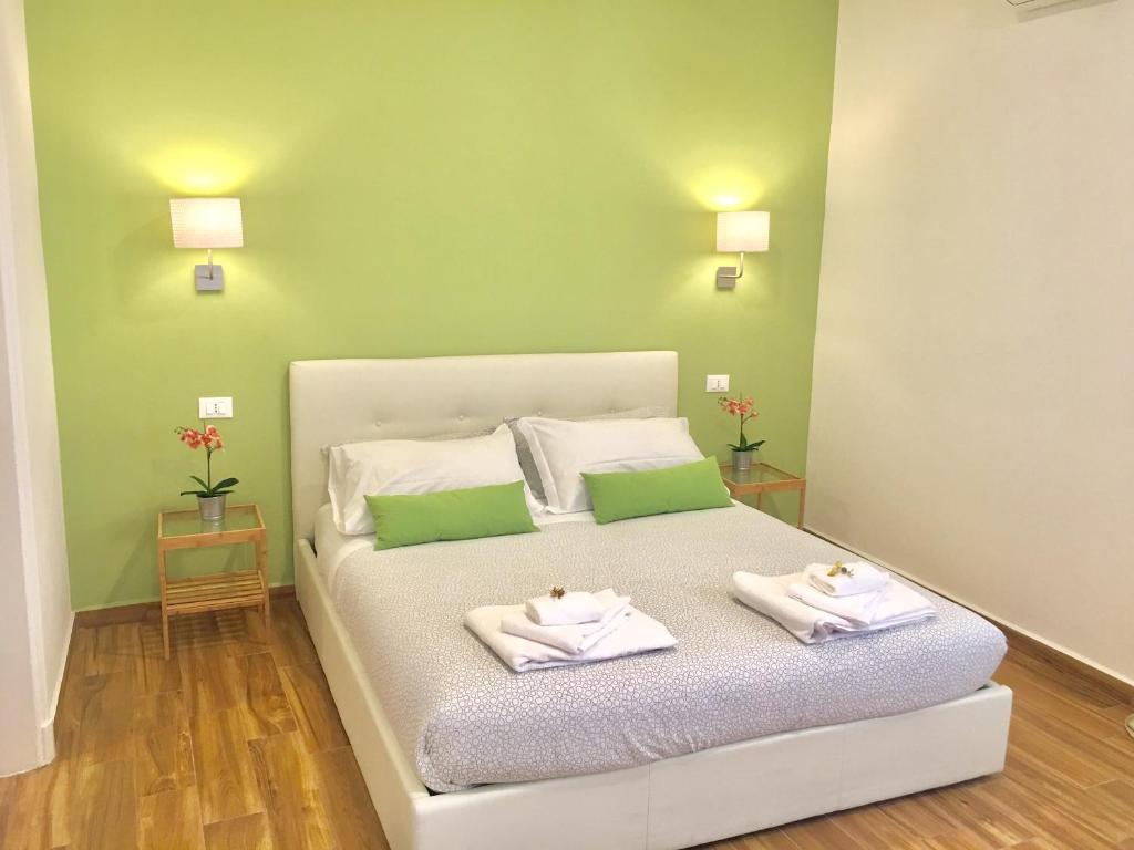 Postel nebo postele na pokoji v ubytování Cavallotti 21
