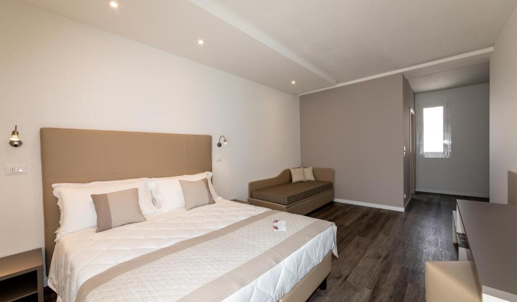 Postel nebo postele na pokoji v ubytování Hotel Mayer