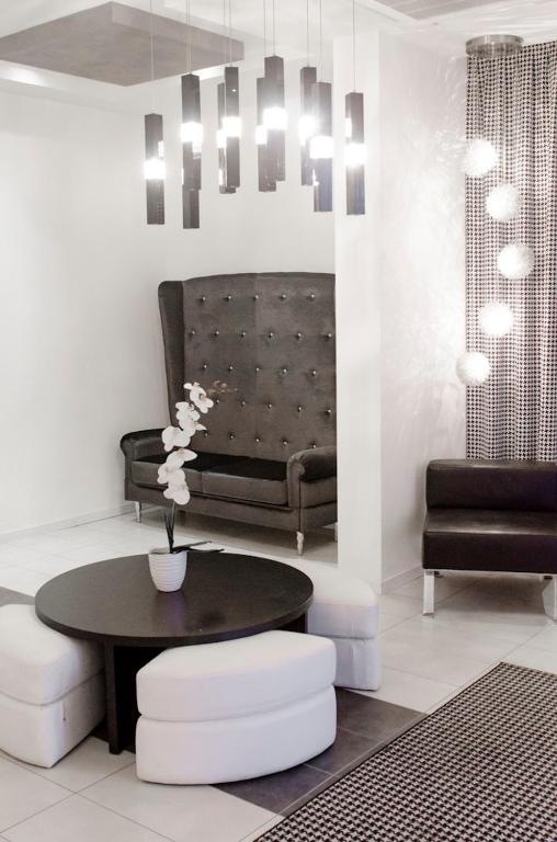 Posezení v ubytování Atmosphere Suite Hotel