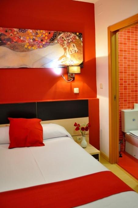Cama o camas de una habitación en Hostal Falfes