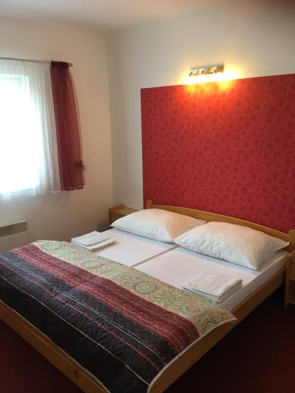 Postel nebo postele na pokoji v ubytování Pension Miltom