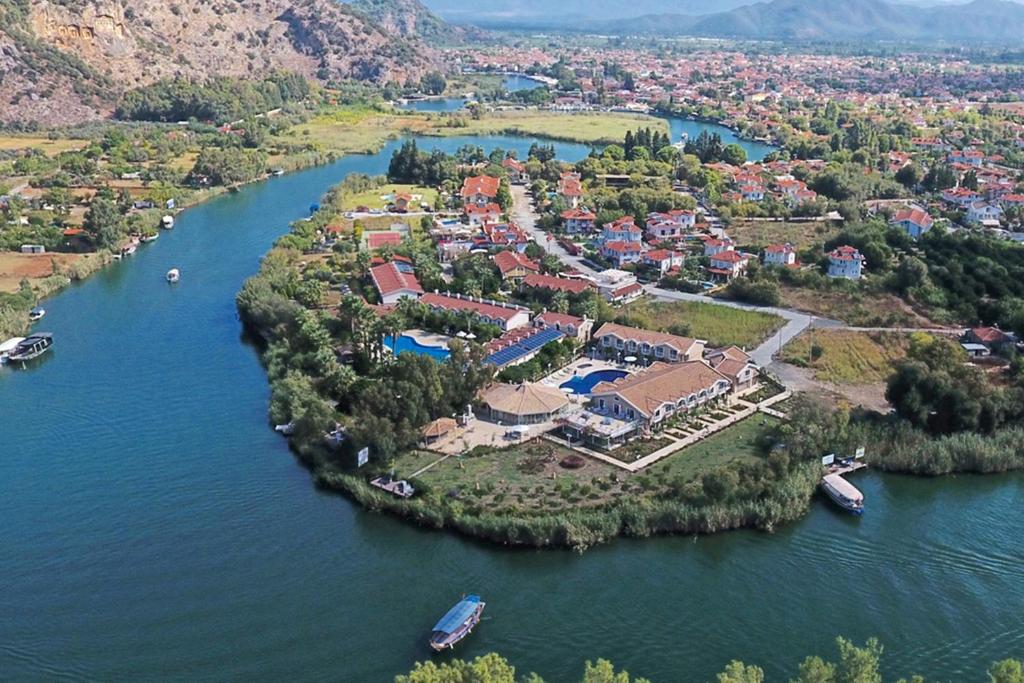 an island in the middle of a river at Dalyan Resort & Spa in Dalyan