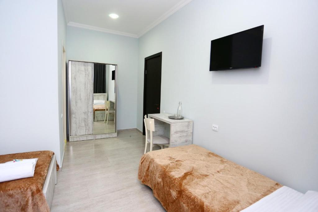 TV a/nebo společenská místnost v ubytování Hotel City Kutaisi