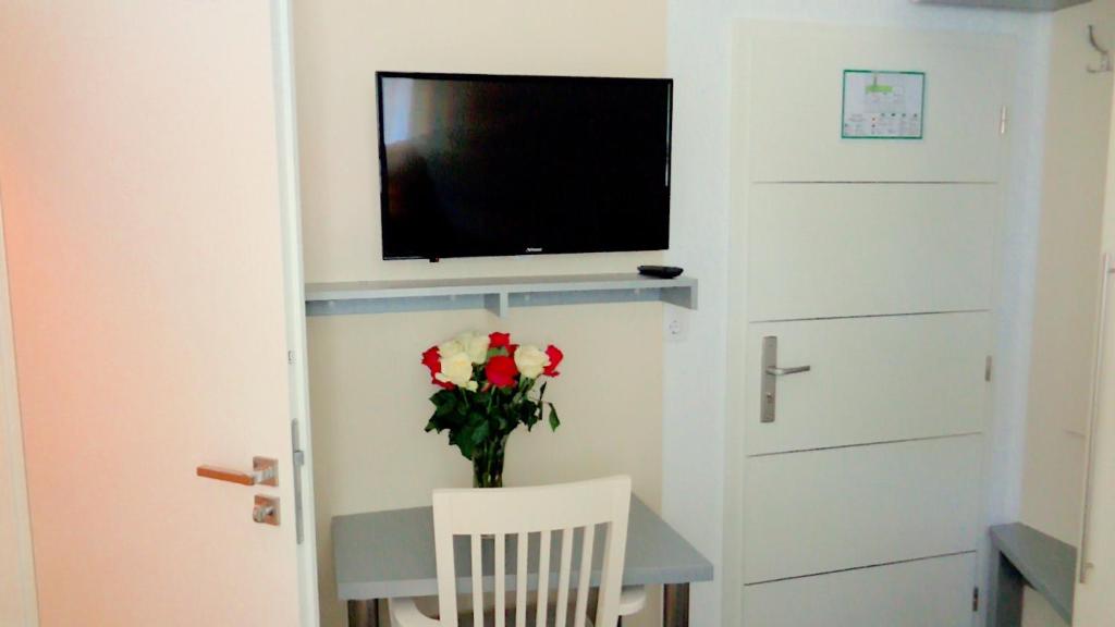 TV a/nebo společenská místnost v ubytování Hotel Stadt Soltau
