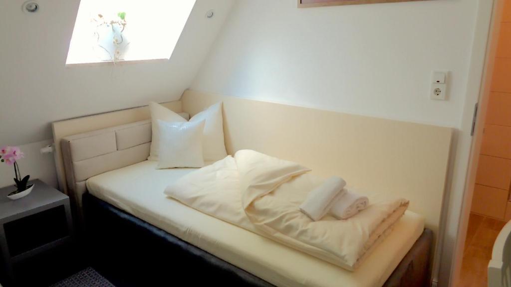 Postel nebo postele na pokoji v ubytování Hotel Stadt Soltau