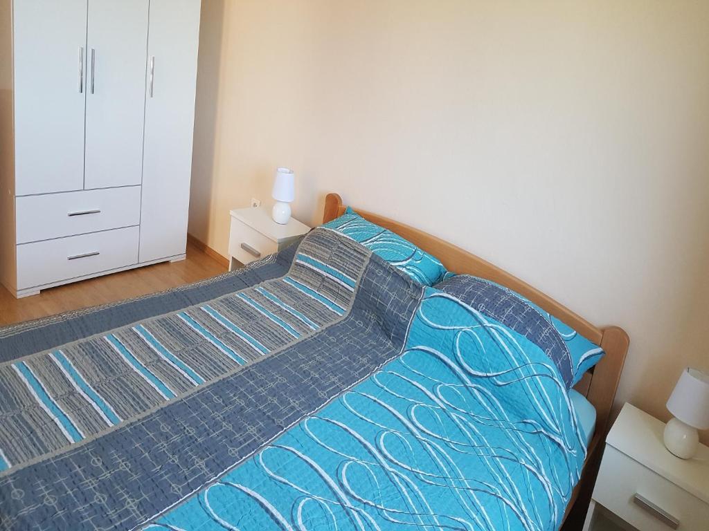 Postel nebo postele na pokoji v ubytování Apartment Stanko