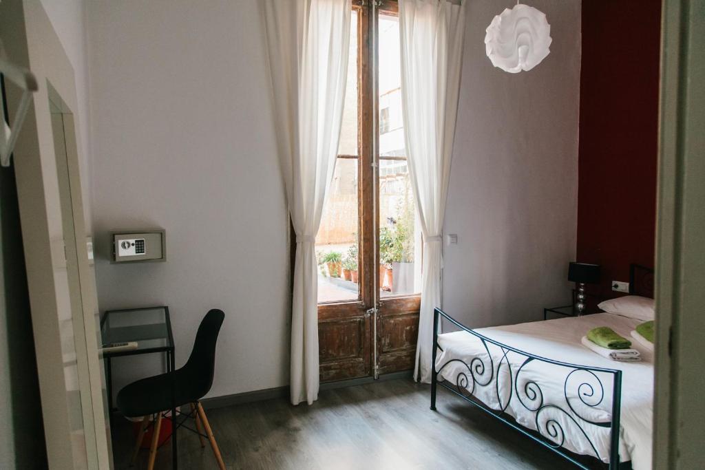 Postel nebo postele na pokoji v ubytování ZOOROOMS Boutique Guesthouse