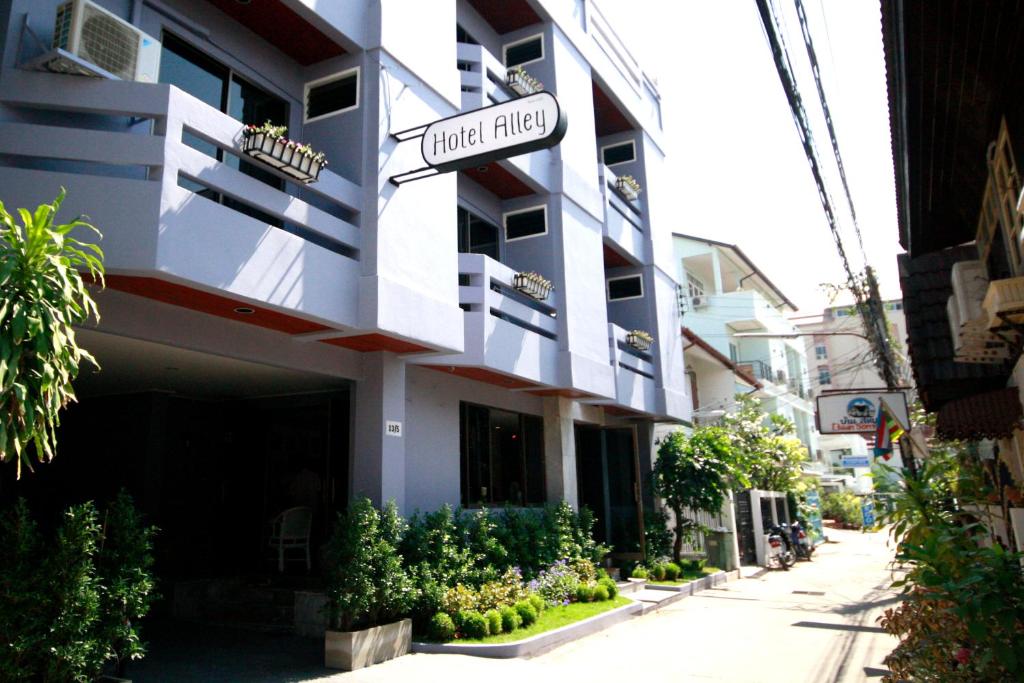 a building with a sign that reads hotel filters at Hotel Alley in Hua Hin