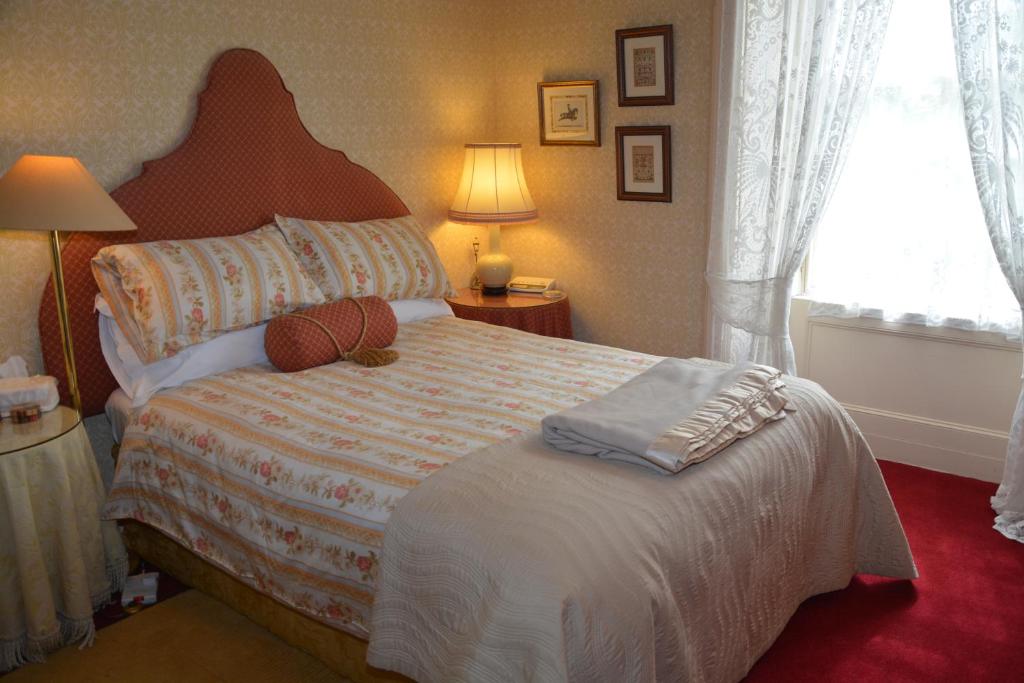 Postel nebo postele na pokoji v ubytování Scaurbridge House