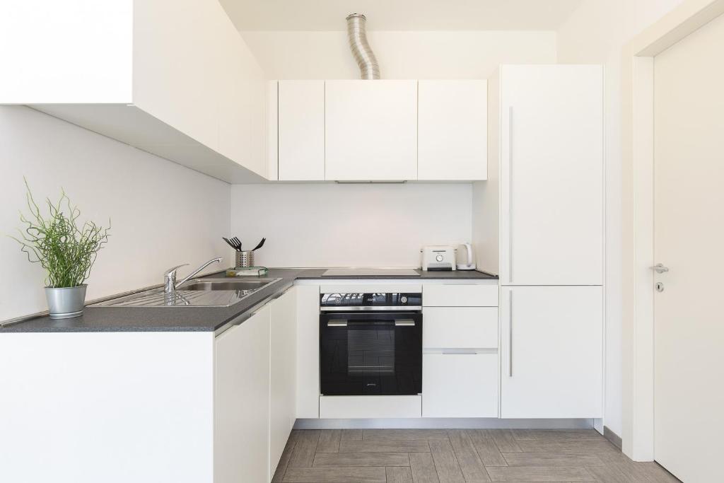 Roggia Apartments by Quokka 360 - central flats with parking space - Apartment With Balcony
