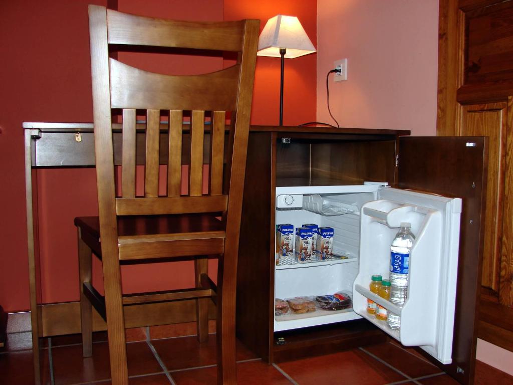 Una cocina o zona de cocina en Apartamentos Sierra de Segura