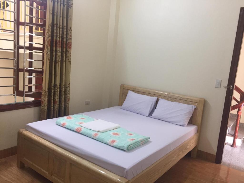 Postel nebo postele na pokoji v ubytování Việt Dũng Motel