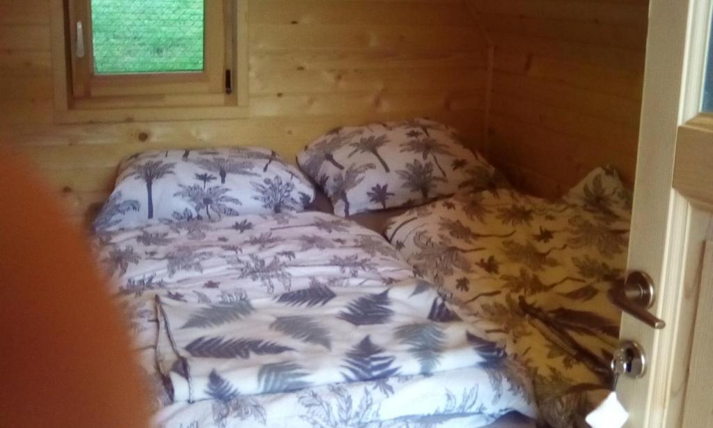 Postel nebo postele na pokoji v ubytování farmglamping Planika - Encijan