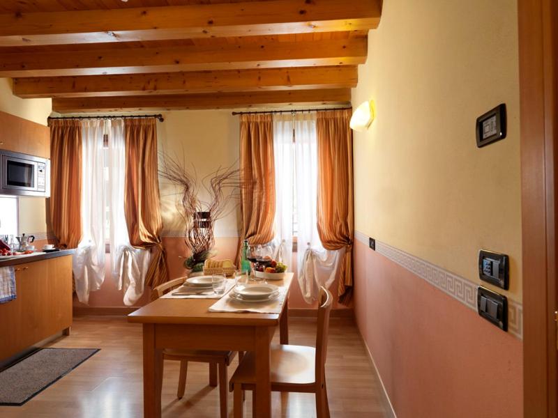 TV a/nebo společenská místnost v ubytování Hotel & Residence Roma