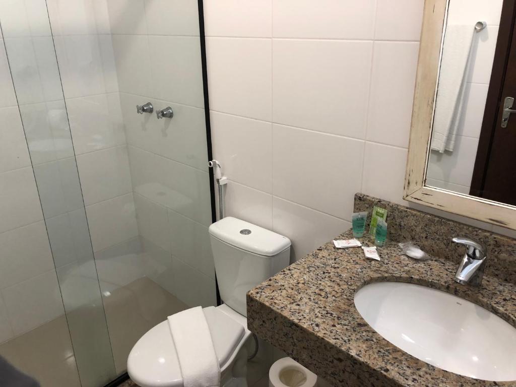 Uma casa de banho em Pousada Rosa