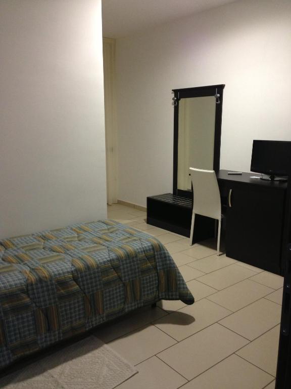 Postel nebo postele na pokoji v ubytování Hotel 660
