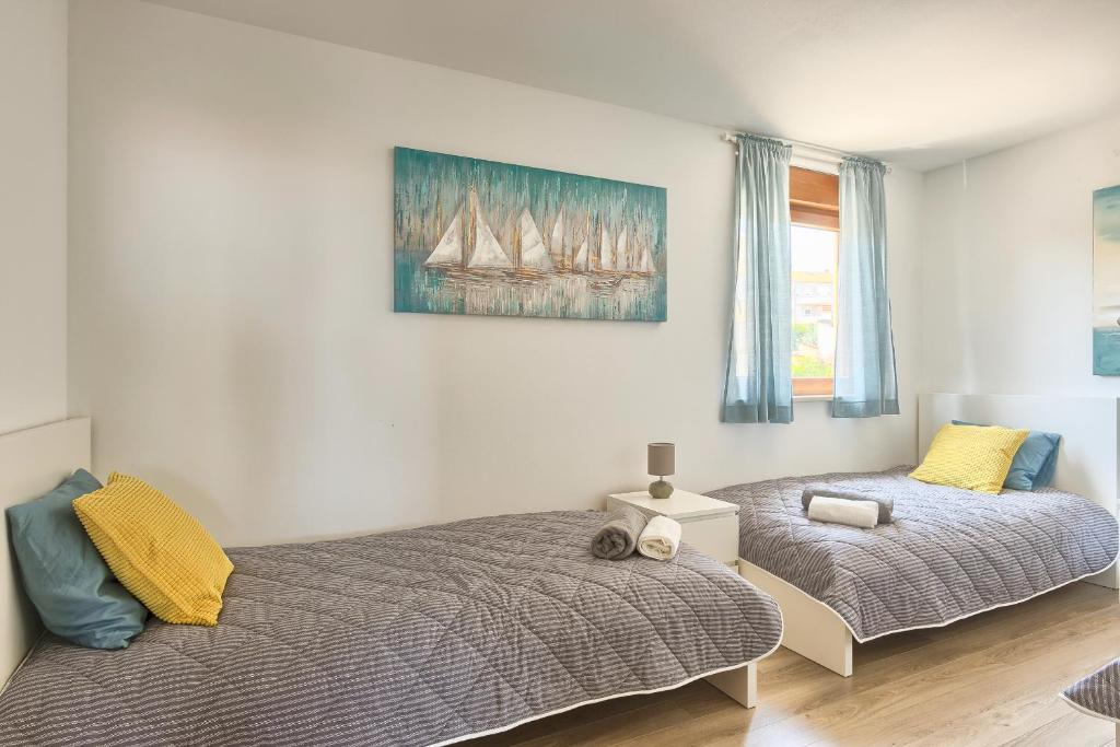 Posteľ alebo postele v izbe v ubytovaní Apartment Peninsula