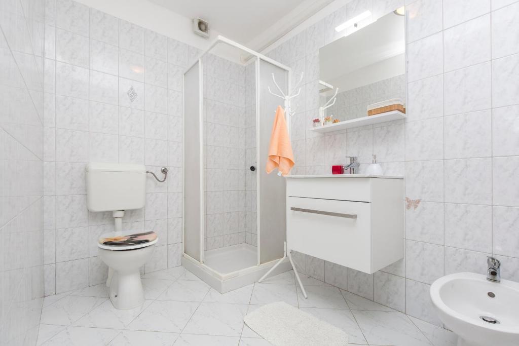Kúpeľňa v ubytovaní Apartments Cekada