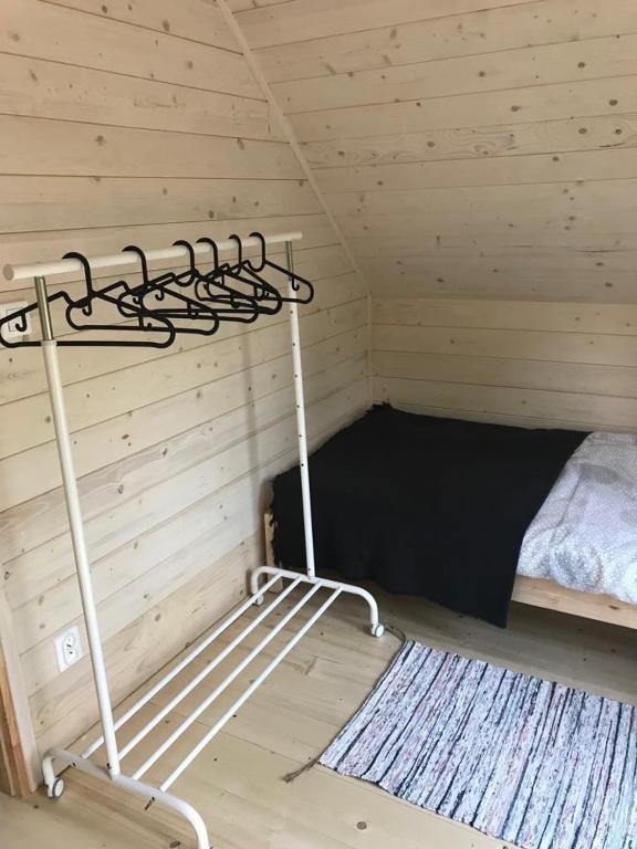 Postel nebo postele na pokoji v ubytování Domki Modrzewiowa 20