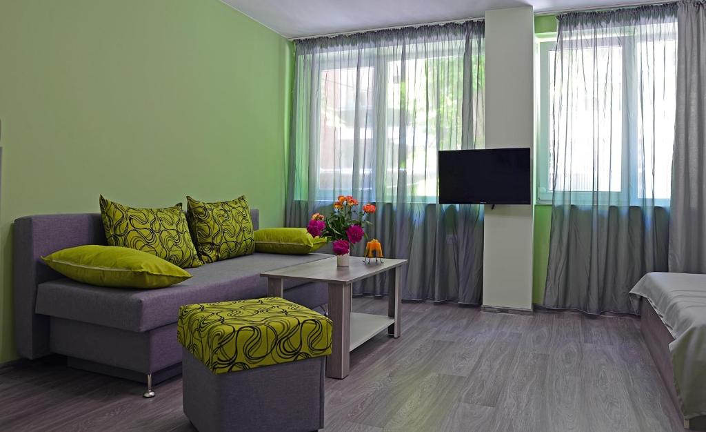 TV a/nebo společenská místnost v ubytování Visito Aparthouse