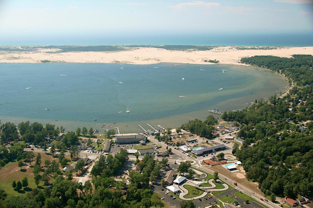 an aerial view of a beach and the ocean at Silver sands resort in Mears