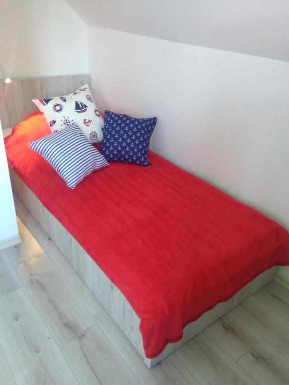Postel nebo postele na pokoji v ubytování Domki Ancora - komfortowe domki nad morzem