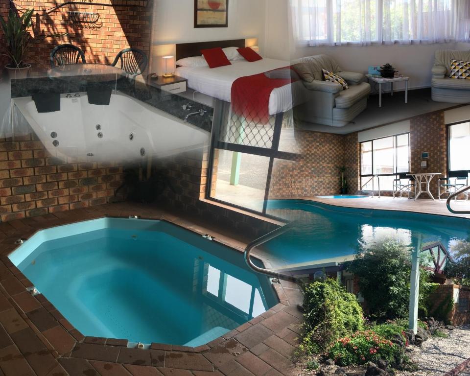 una vista aérea de una piscina en una casa en Horsham Mid City Court Motel, en Horsham