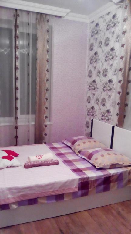Postel nebo postele na pokoji v ubytování natia