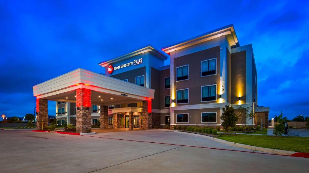 a rendering of a hotel at night at Best Western Plus Bay City Inn & Suites in Bay City