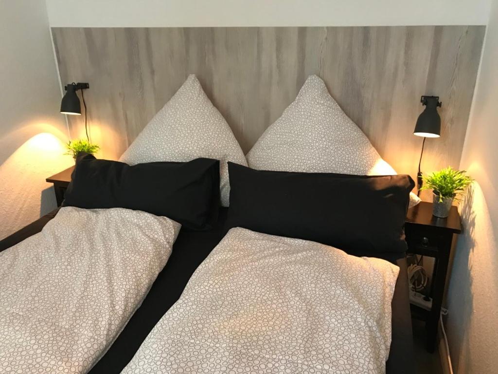 Postel nebo postele na pokoji v ubytování Apartment am Wall