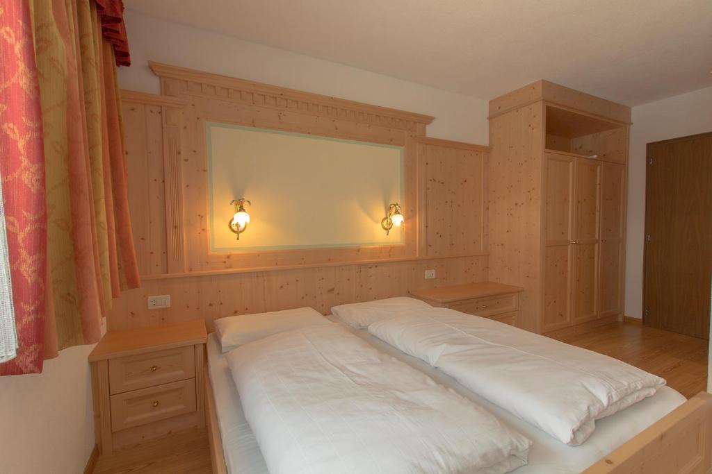Postel nebo postele na pokoji v ubytování B&B Apartments La Palsa