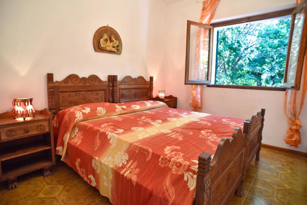 Een bed of bedden in een kamer bij Villa Margherita
