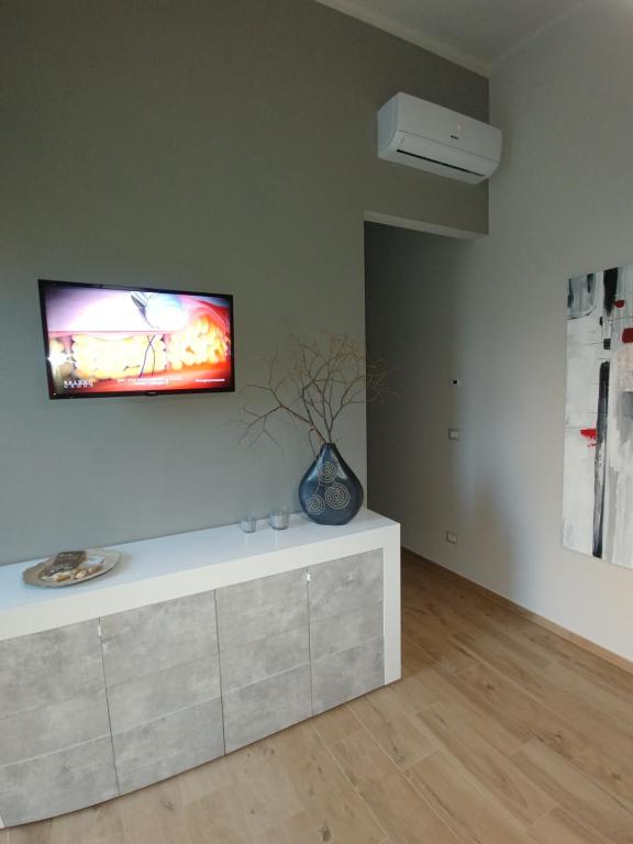 TV a/nebo společenská místnost v ubytování Diadumeno Superior Apartment