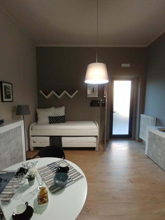 Postel nebo postele na pokoji v ubytování Diadumeno Superior Apartment