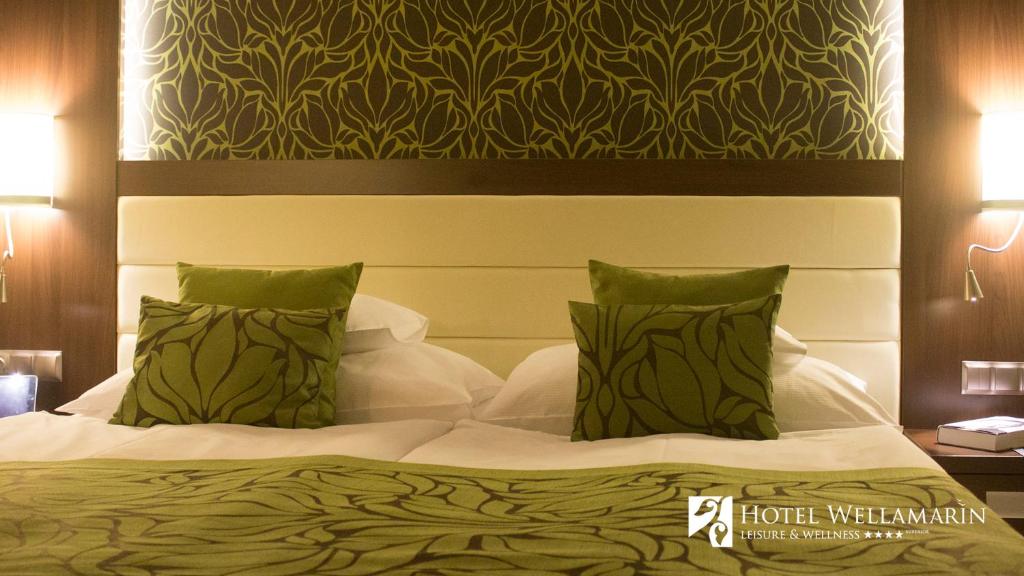 Postel nebo postele na pokoji v ubytování Hotel Wellamarin