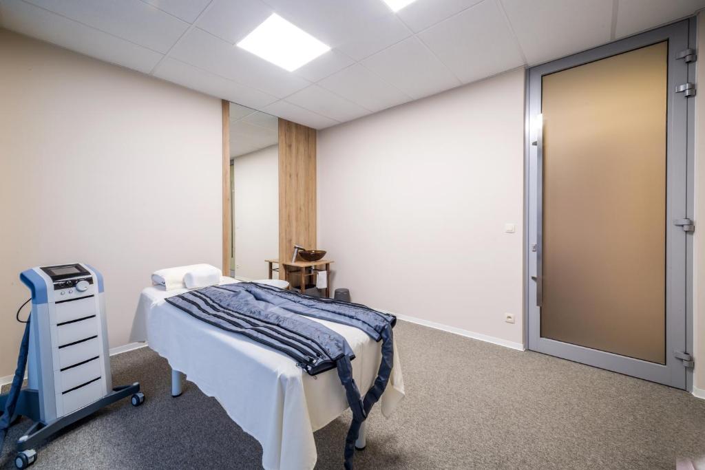 Postel nebo postele na pokoji v ubytování Village Resort Hanuliak Apartmany