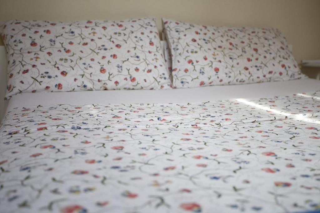 Postel nebo postele na pokoji v ubytování Farmstay Kmetija Štekar