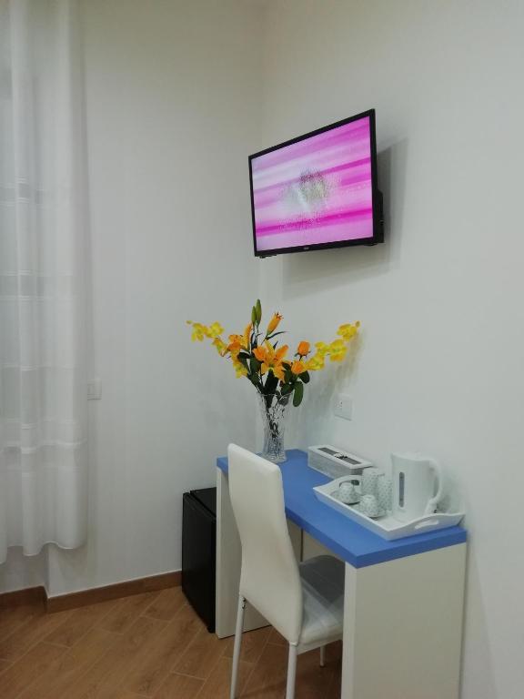 Telewizja i/lub zestaw kina domowego w obiekcie Affittacamere ELVI