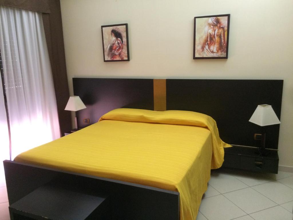 Postel nebo postele na pokoji v ubytování B&B Armony 111