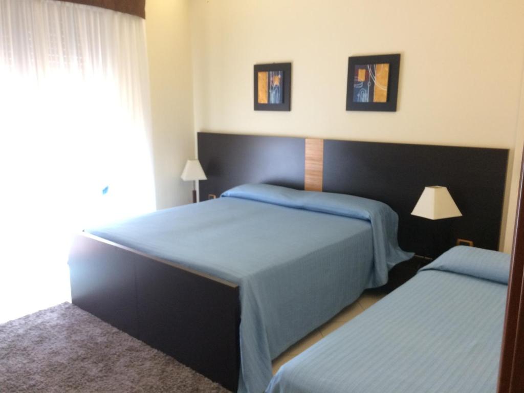 Postel nebo postele na pokoji v ubytování B&B Armony 111