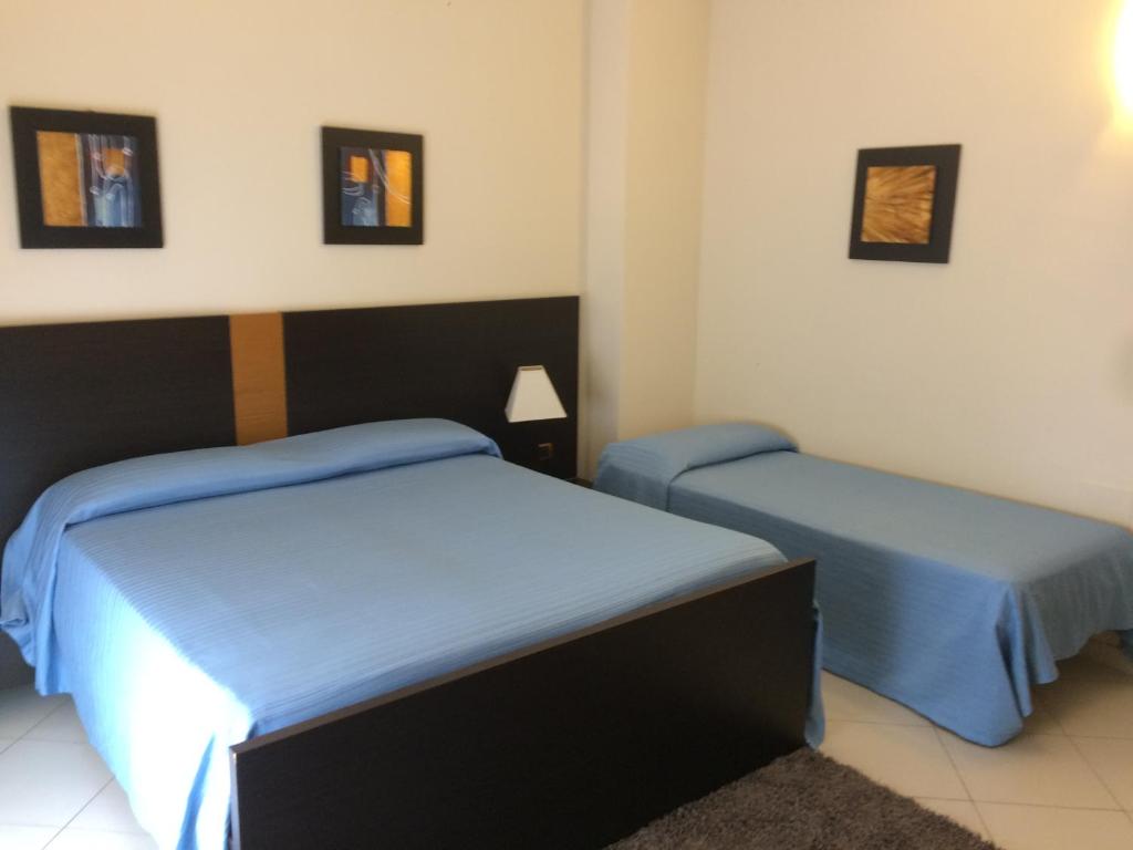 Postel nebo postele na pokoji v ubytování B&B Armony 111
