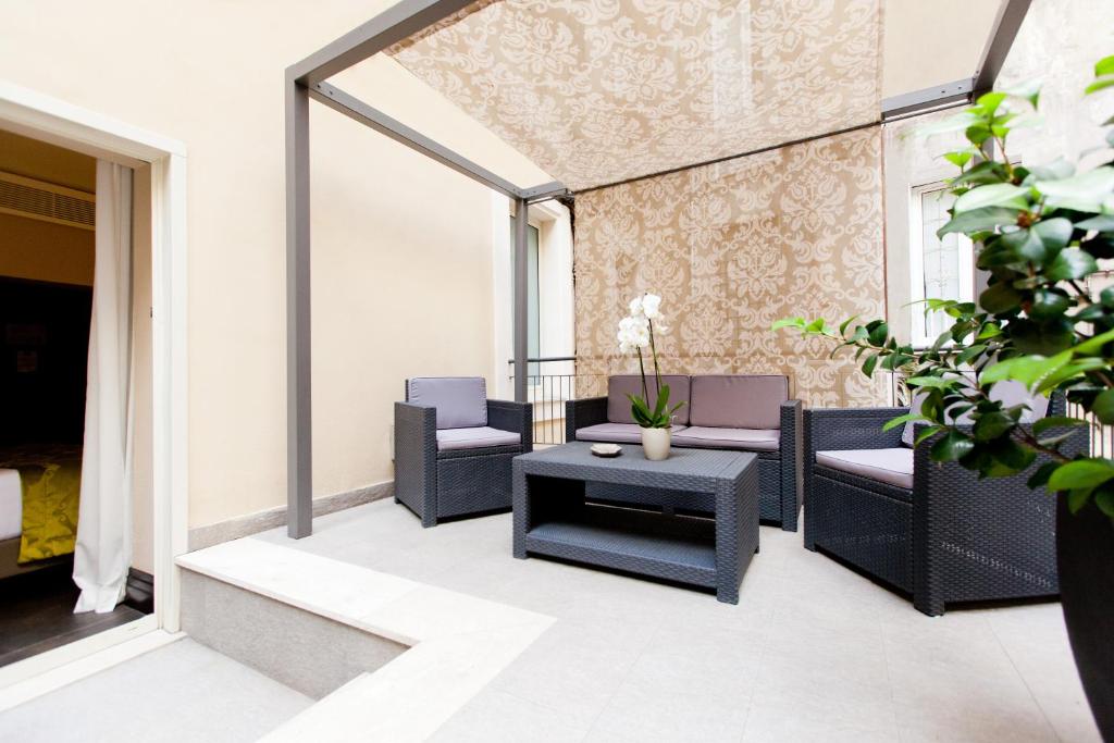 Posedenie v ubytovaní Quirinale Luxury Rooms